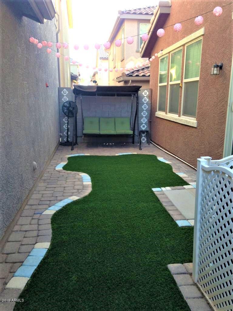 511 North Ranger Trail Gilbert, AZ 85234 - Photo 21 of 26 Back Yard with Turf and Pavers