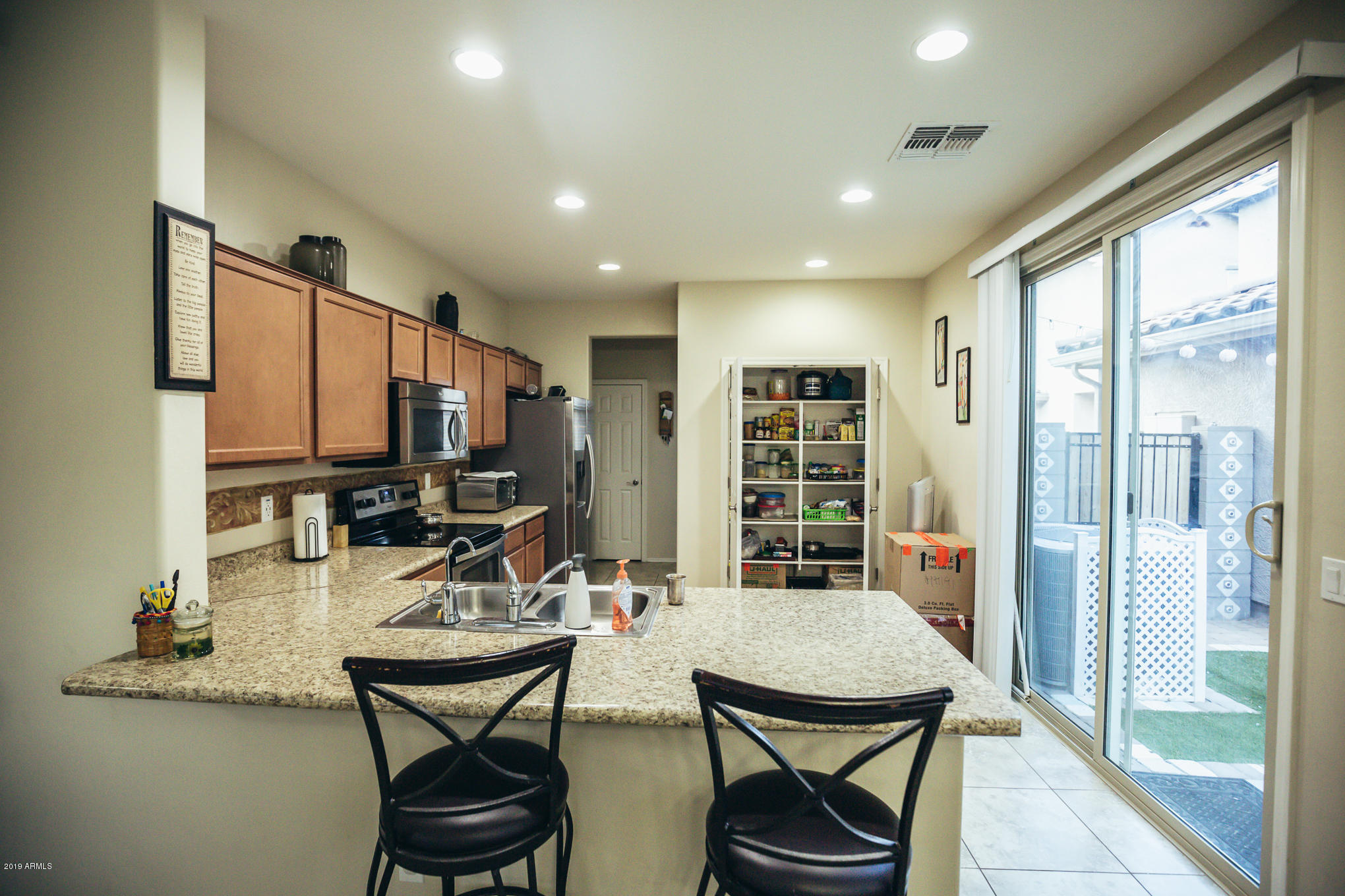 511 North Ranger Trail Gilbert, AZ 85234 - Photo 6 of 26 Kitchen and Pantry