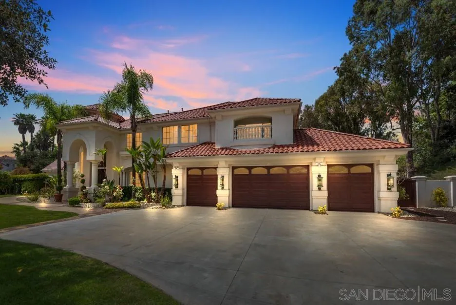 6704 Rancho Lakes Court Rancho Santa Fe, CA 92067 - Photo 1 of 1 a front view of a house with a yard