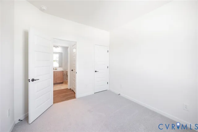 a view of a room with a hallway