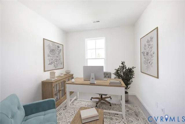 a living room with furniture and window