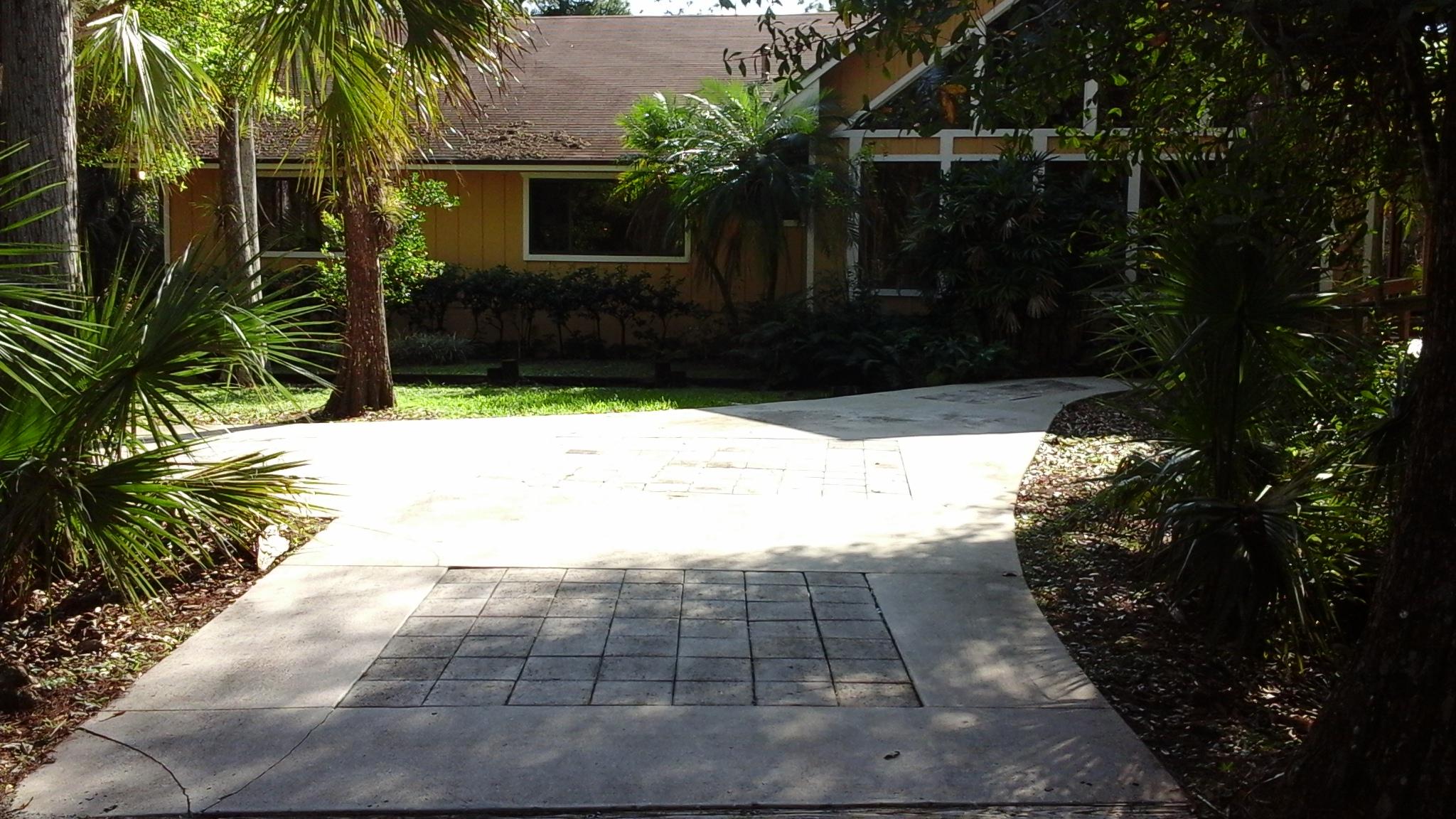 11154 Sandy Run Road Jupiter, FL 33478 - Photo 3 of 45 jupiterdrivewayfront