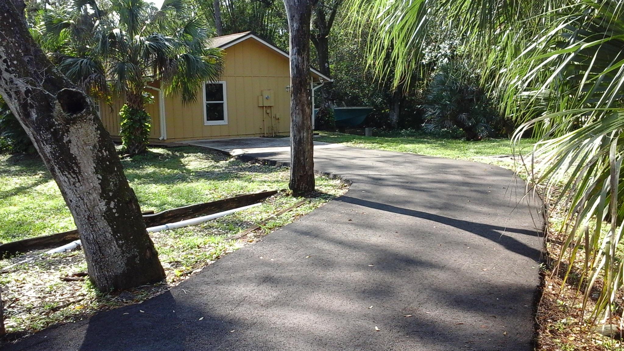 11154 Sandy Run Road Jupiter, FL 33478 - Photo 32 of 45 jupiterbackdriveway