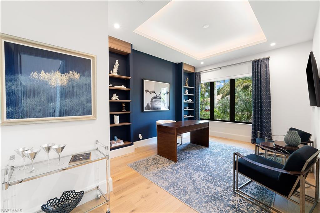 470 Wedge Drive Naples, FL 34103 - Photo 22 of 28 a living room with furniture and window