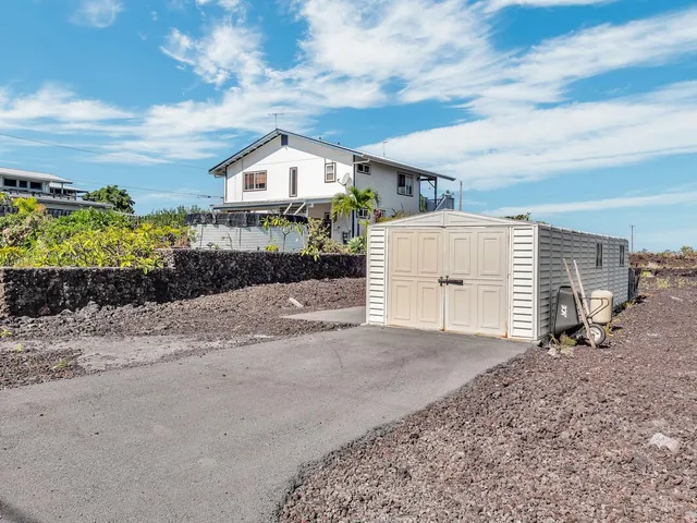 a view of a garage with storage