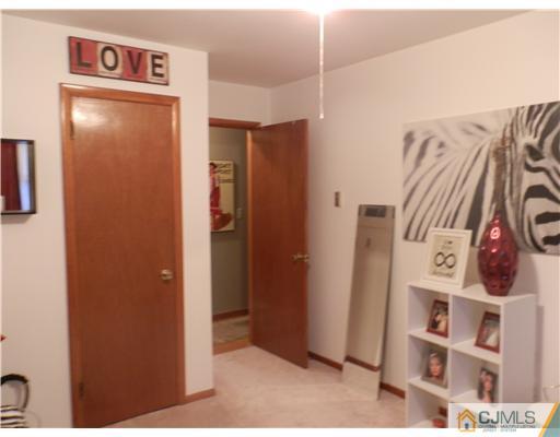 25 Rector Avenue Woodbridge, NJ 07095 - Photo 7 of 14 a view of walk in closet