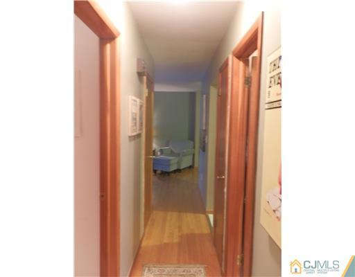 25 Rector Avenue Woodbridge, NJ 07095 - Photo 10 of 14 a en suite bathroom with a toilet