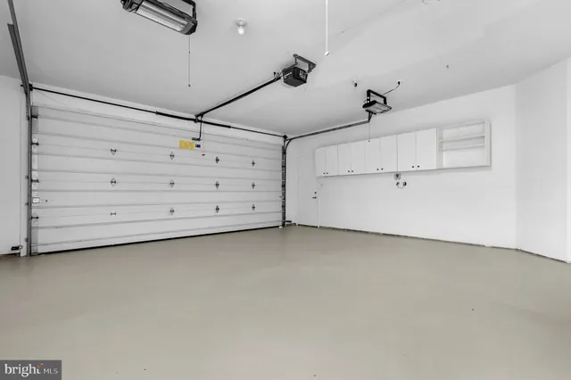 a view of a livingroom with furniture and windows