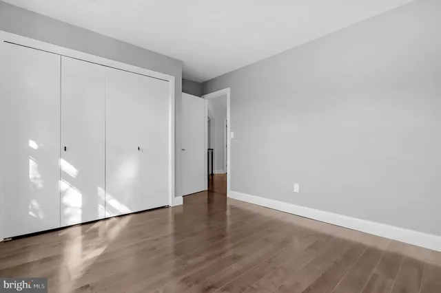 a bathroom with a sink vanity and a mirror