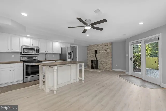 a view of balcony with wooden floor