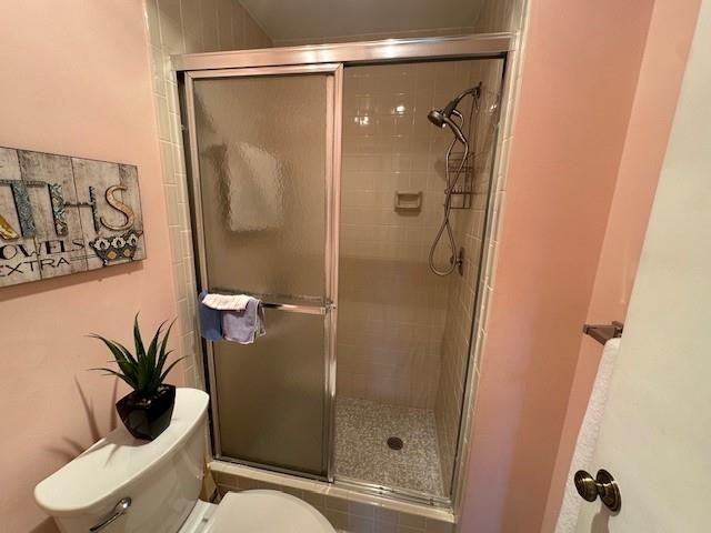 1985 Southwest 15th Street, Unit 126 Deerfield Beach, FL 33442 - Photo 11 of 27 a bathroom with a shower and a toilet