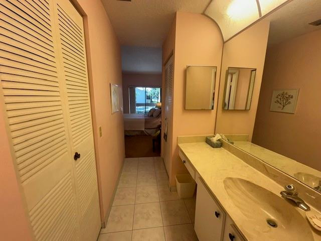 1985 Southwest 15th Street, Unit 126 Deerfield Beach, FL 33442 - Photo 12 of 27 a bathroom with a granite countertop sink and a mirror