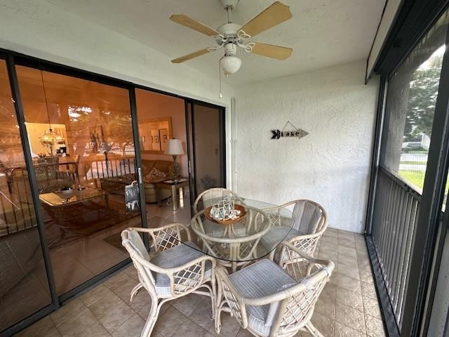 1985 Southwest 15th Street, Unit 126 Deerfield Beach, FL 33442 - Photo 16 of 27 a view of a dining room with furniture window and outside view