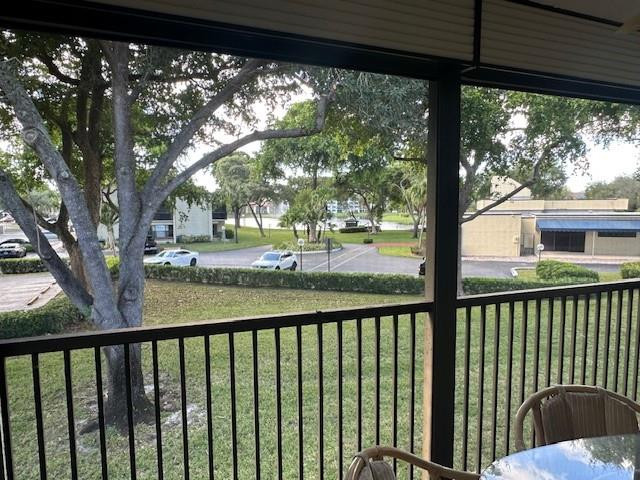 1985 Southwest 15th Street, Unit 126 Deerfield Beach, FL 33442 - Photo 2 of 27 a view of a street from a balcony