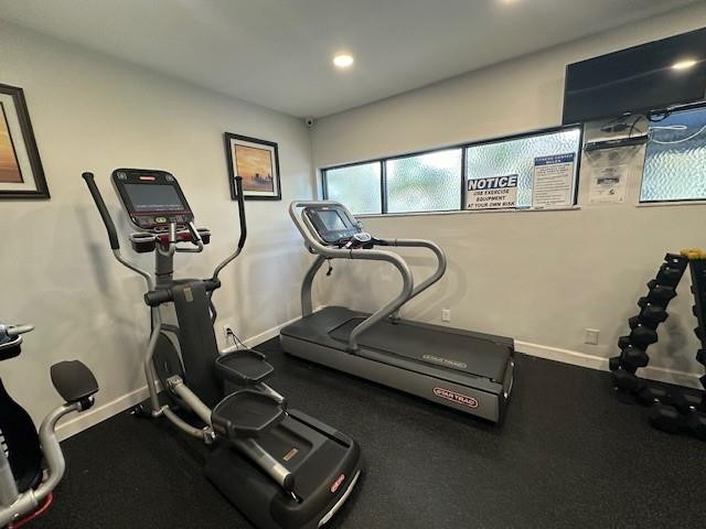 1985 Southwest 15th Street, Unit 126 Deerfield Beach, FL 33442 - Photo 23 of 27 a room with gym equipment