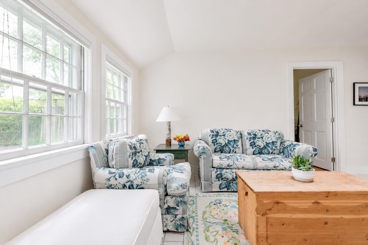12 King Street Nantucket, MA 02554 - Photo 24 of 32 a living room with furniture and a potted plant