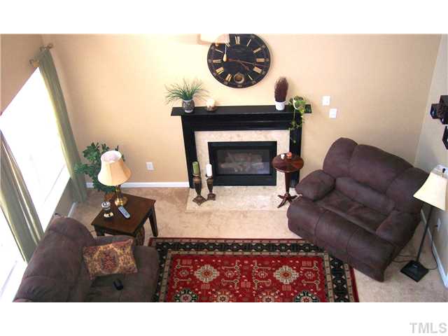108 Riley Oaks Lane Apex, NC 27539 - Photo 13 of 22 The 2-Story Family Room is a great meeting place for family & friends...