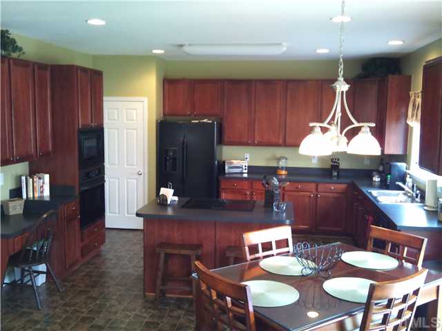 108 Riley Oaks Lane Apex, NC 27539 - Photo 14 of 22 Enormous Kitchen Area...for the Chef in YOU!