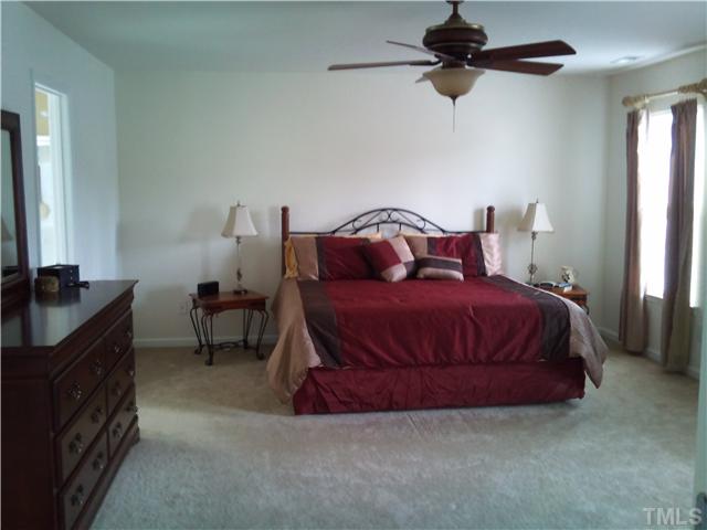 108 Riley Oaks Lane Apex, NC 27539 - Photo 15 of 22 Relax in YOUR Master Suite after long day of work! Features include: Walk-In Closet, Garden Tub & Separate Shower...