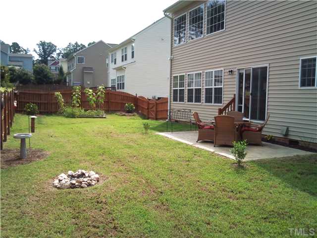 108 Riley Oaks Lane Apex, NC 27539 - Photo 21 of 22 OVERSIZED Stone Patio for the family to enjoy!