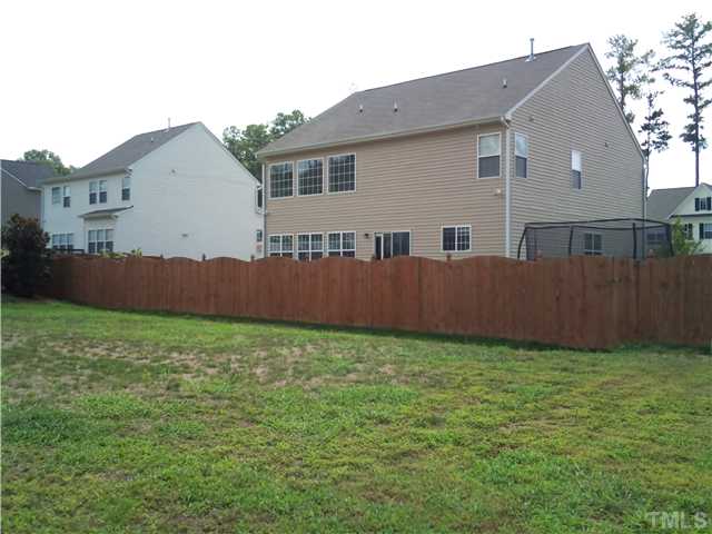 108 Riley Oaks Lane Apex, NC 27539 - Photo 22 of 22 Enjoy the spacious fenced backyard!