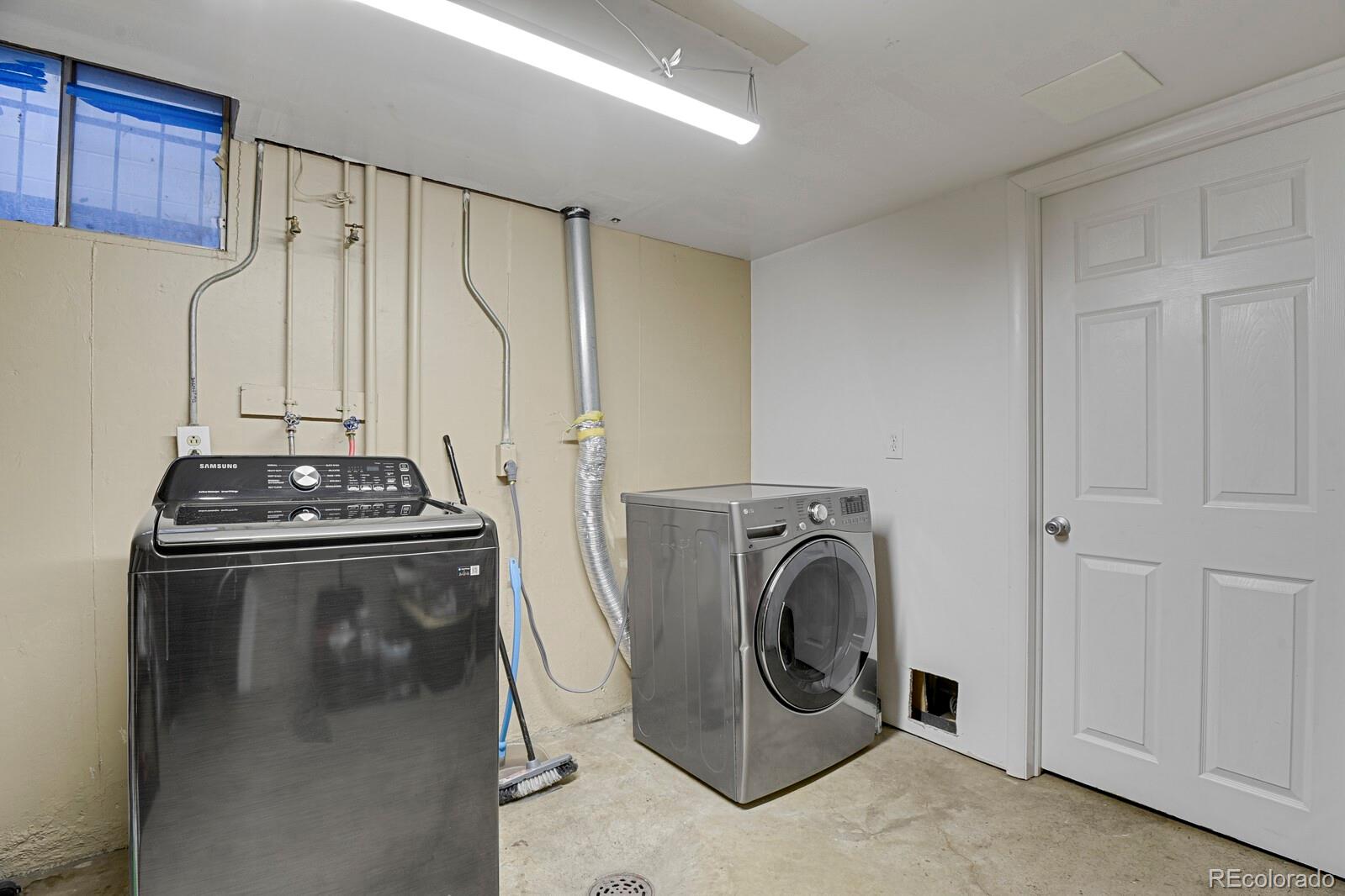 233 South Decatur Street Denver, CO 80219 - Photo 18 of 35 a utility room with dryer and washer