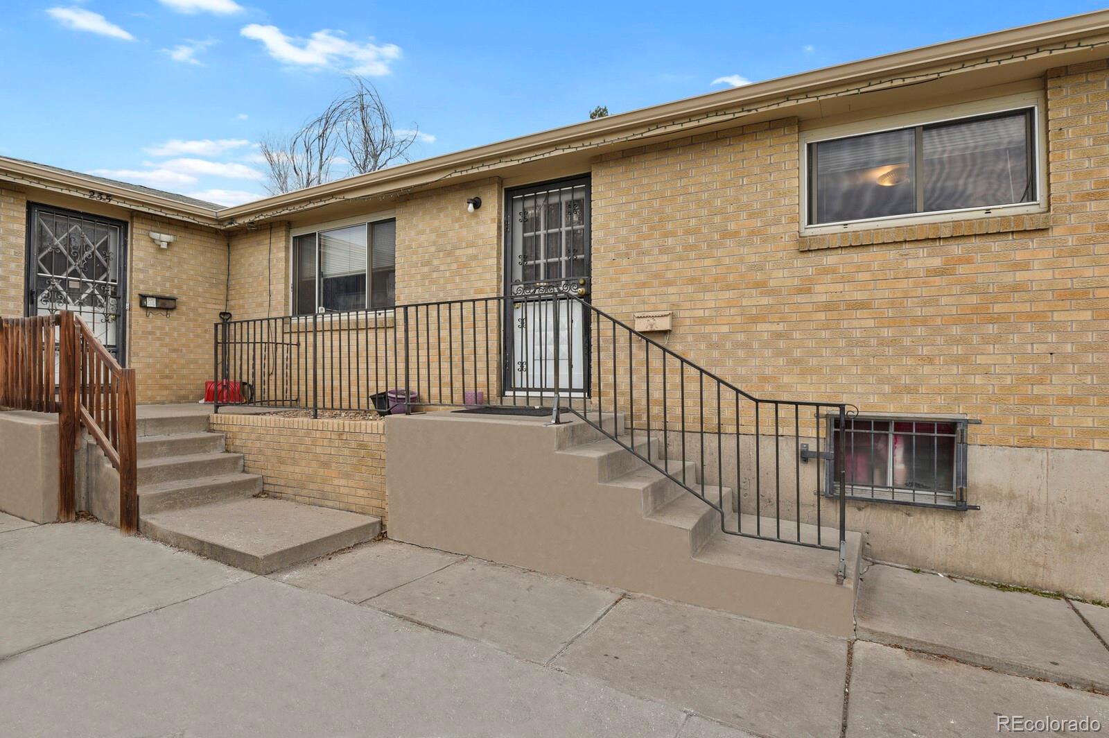 233 South Decatur Street Denver, CO 80219 - Photo 2 of 35 a view of a house with wooden wall and a window