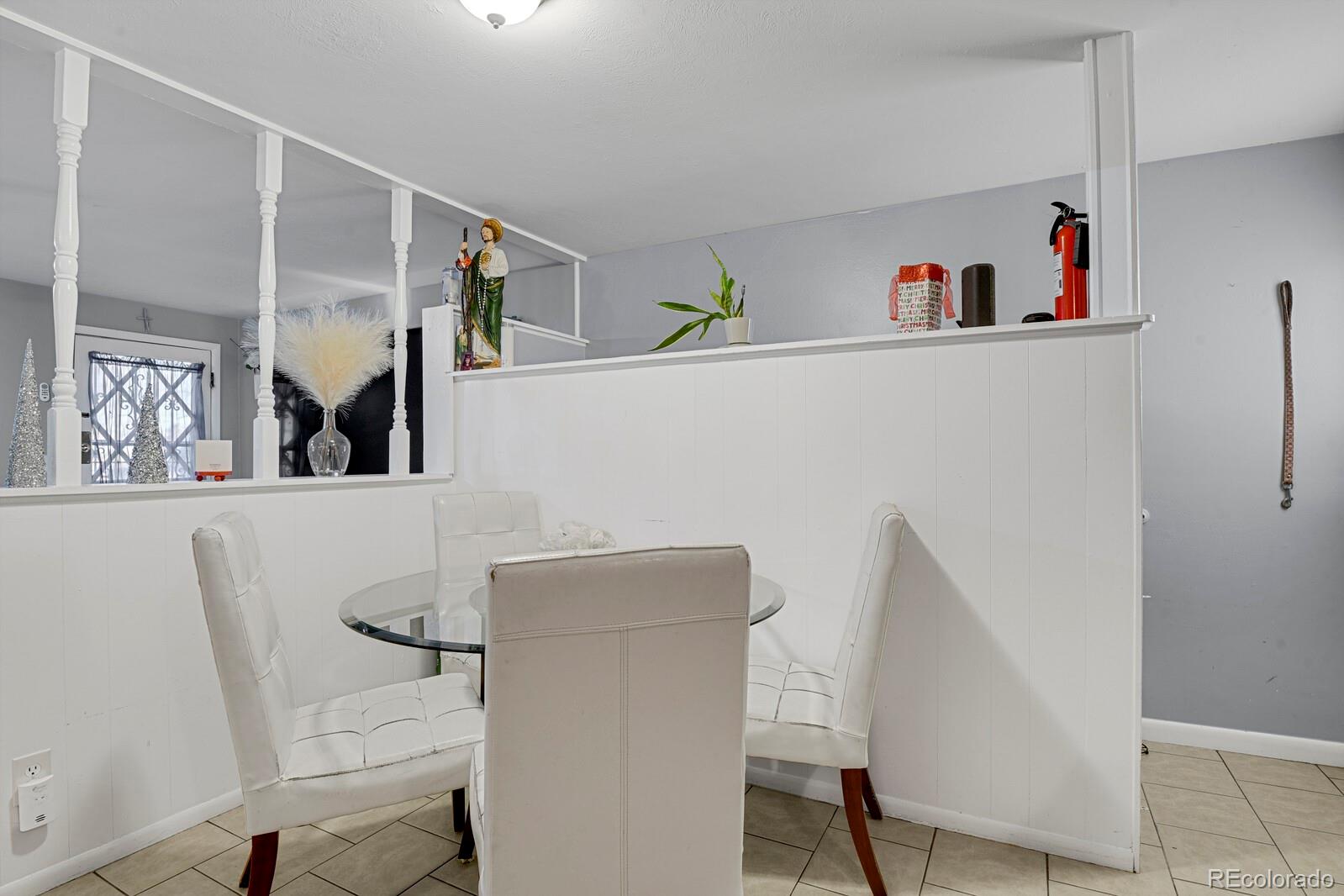 233 South Decatur Street Denver, CO 80219 - Photo 22 of 35 a view of cabinets and chair