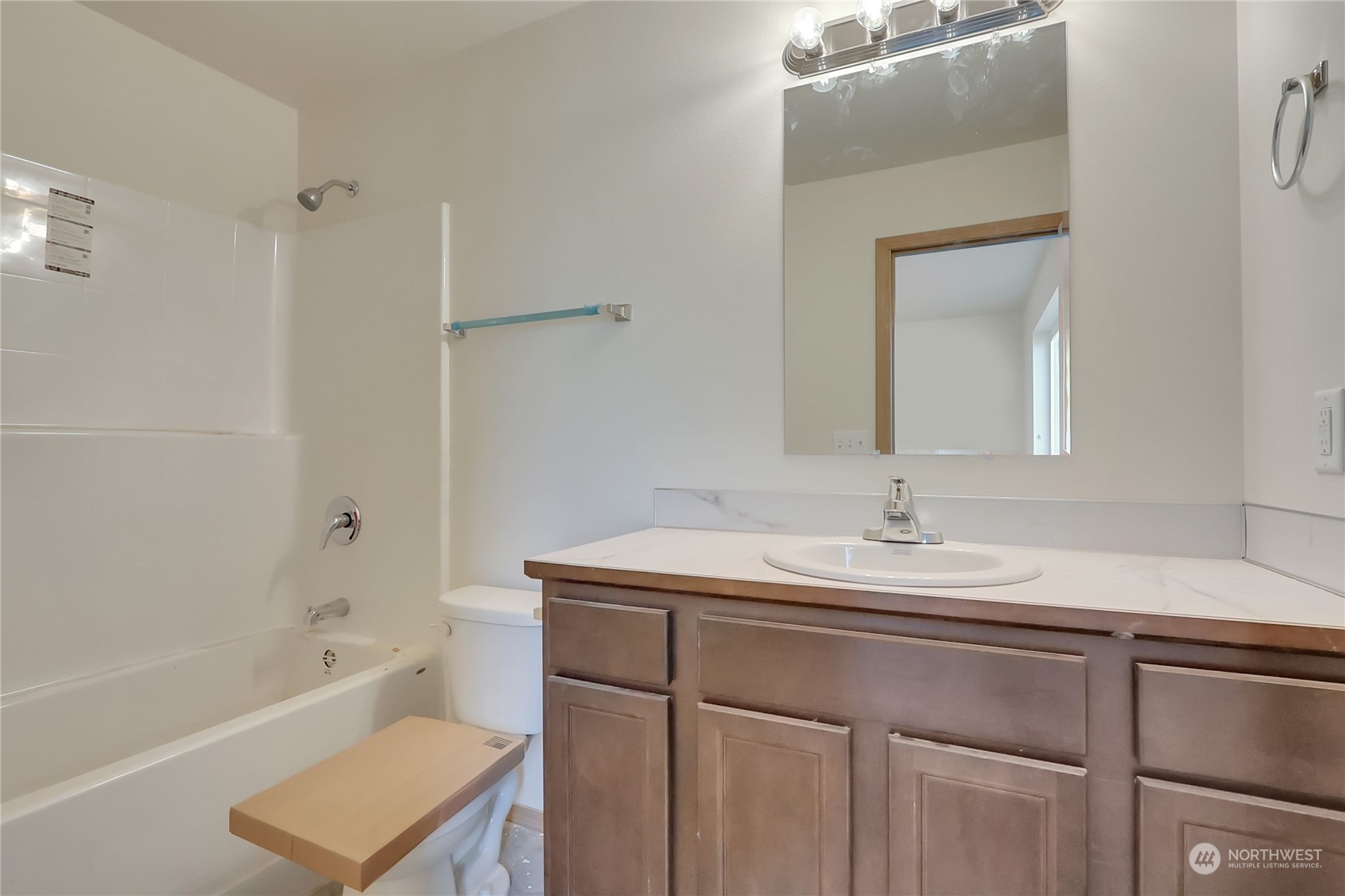 114 Gunnell Road Winlock, WA 98596 - Photo 11 of 23 a bathroom with a sink toilet vanity tub and shower