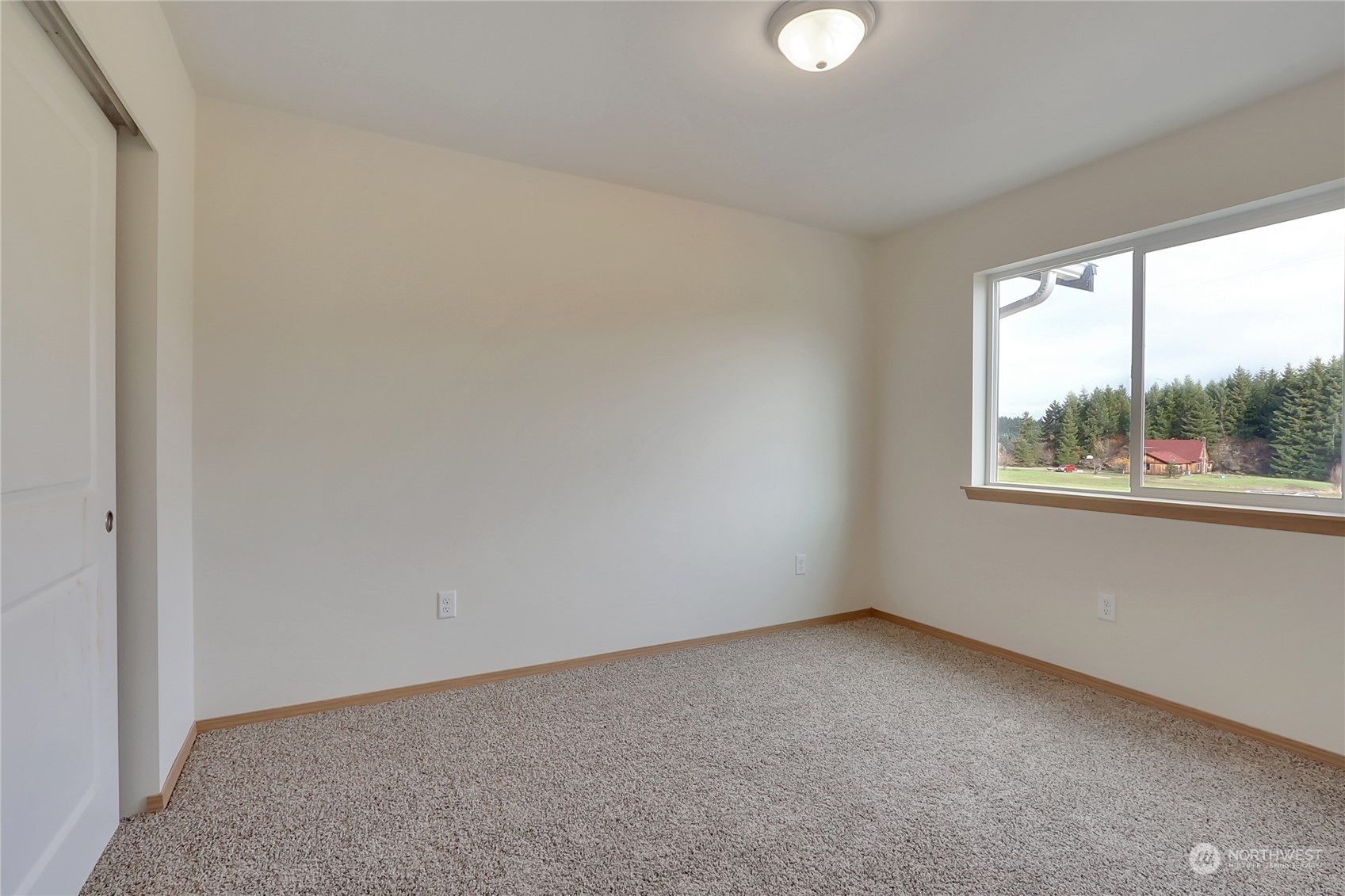 114 Gunnell Road Winlock, WA 98596 - Photo 14 of 23 an empty room with windows and window