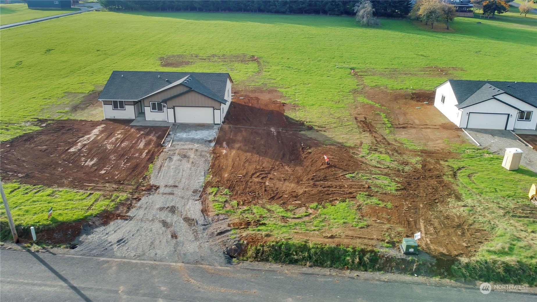 114 Gunnell Road Winlock, WA 98596 - Photo 16 of 23 a view of a lake with a yard
