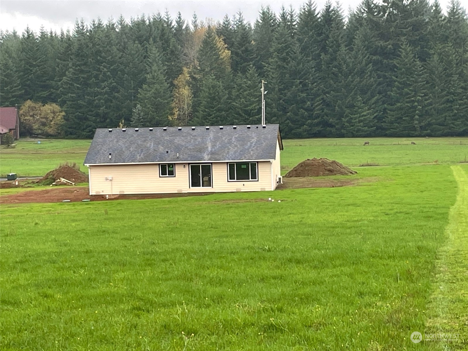 114 Gunnell Road Winlock, WA 98596 - Photo 19 of 23 a view of a house with a yard