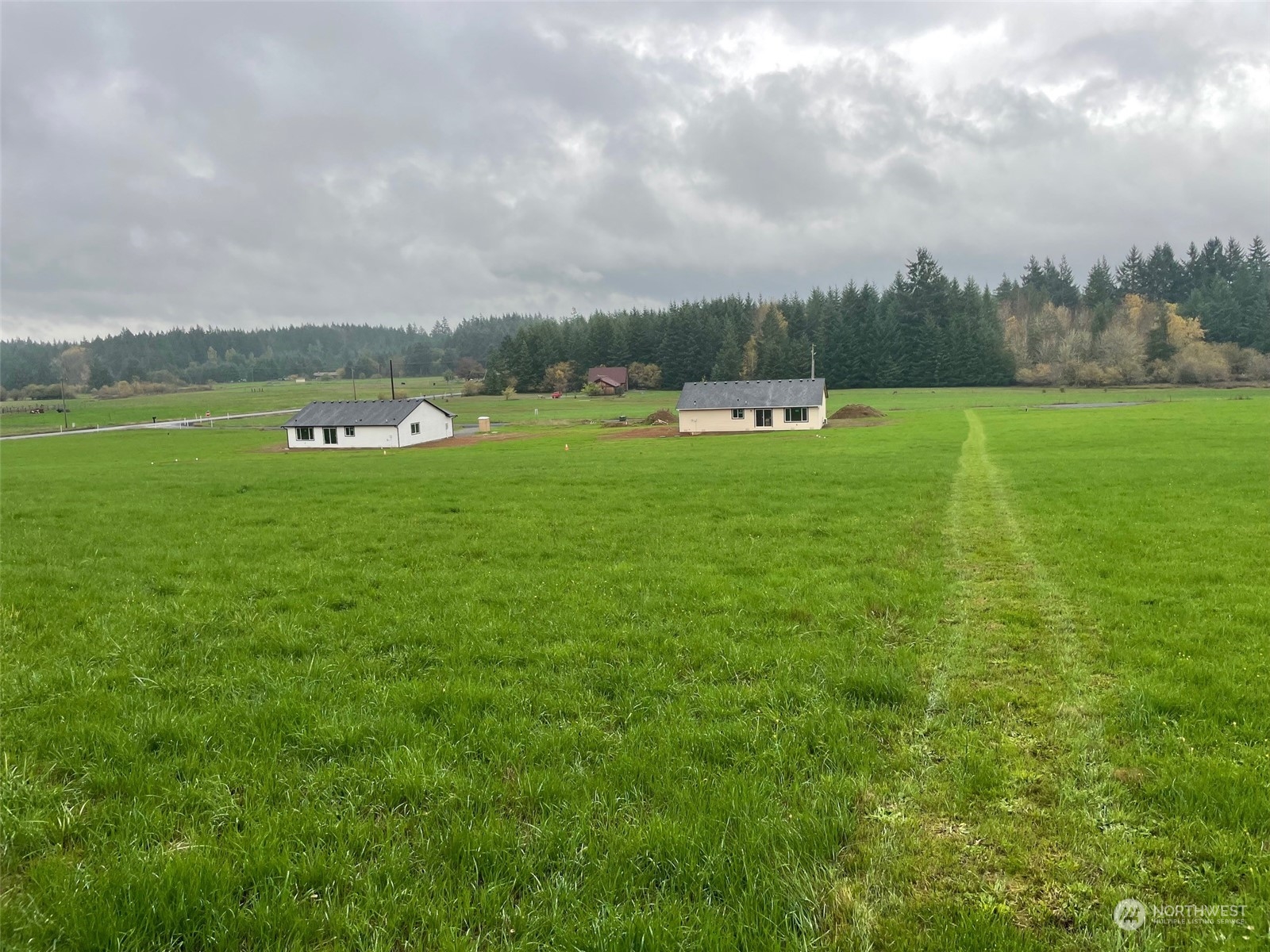 114 Gunnell Road Winlock, WA 98596 - Photo 21 of 23 a view of a green field and covered with lots of green space