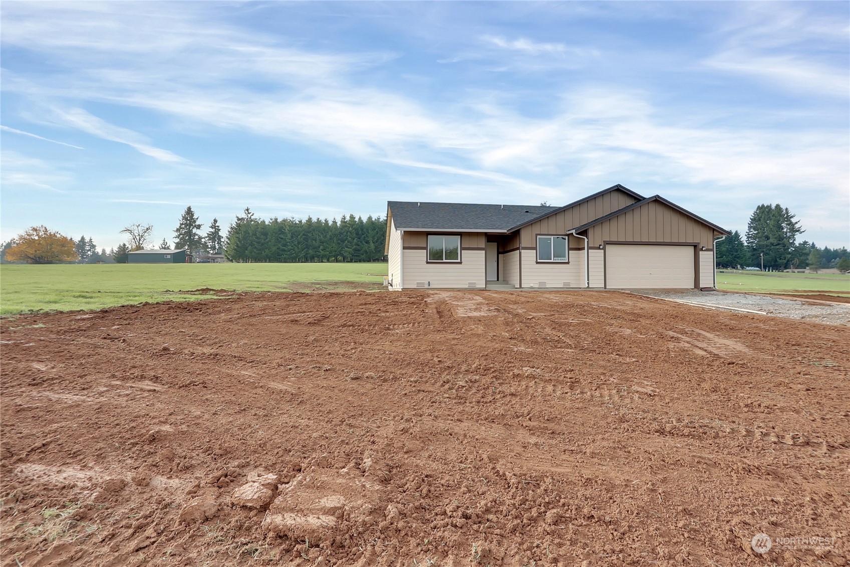 114 Gunnell Road Winlock, WA 98596 - Photo 22 of 23 a big house with a big yard and large trees