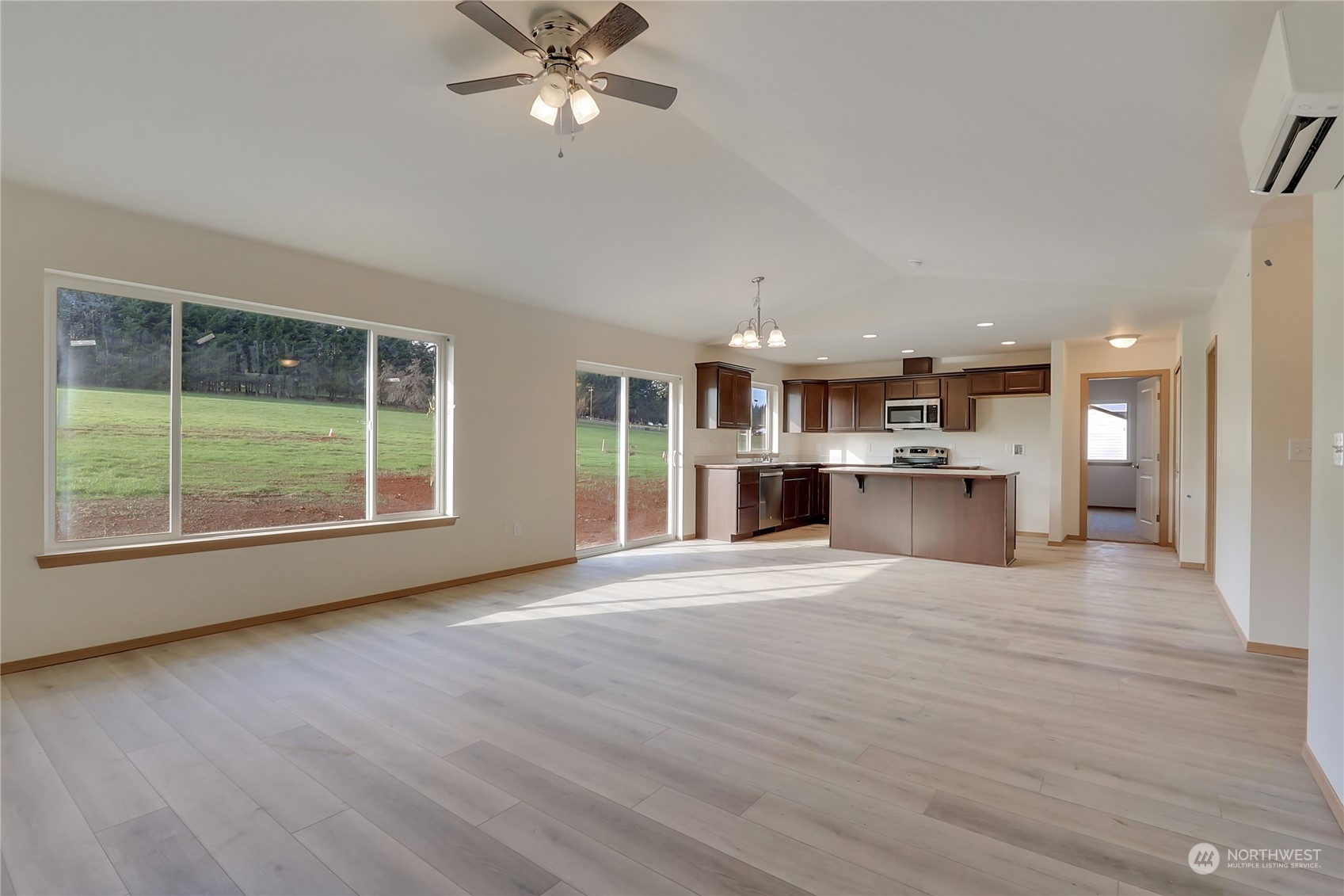 114 Gunnell Road Winlock, WA 98596 - Photo 6 of 23 a view of a kitchen with a sink and a window