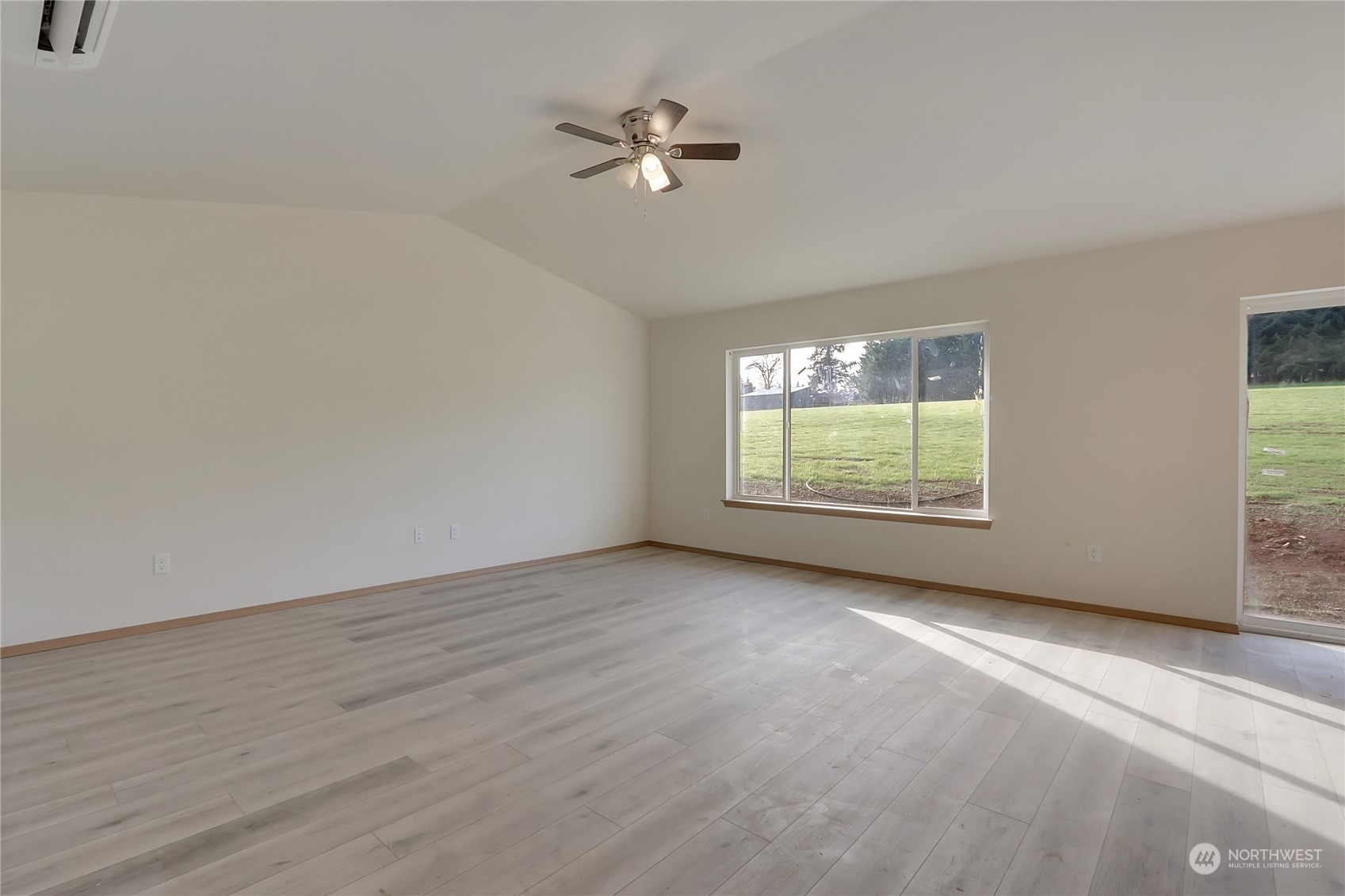 114 Gunnell Road Winlock, WA 98596 - Photo 8 of 23 a view of an empty room with a window