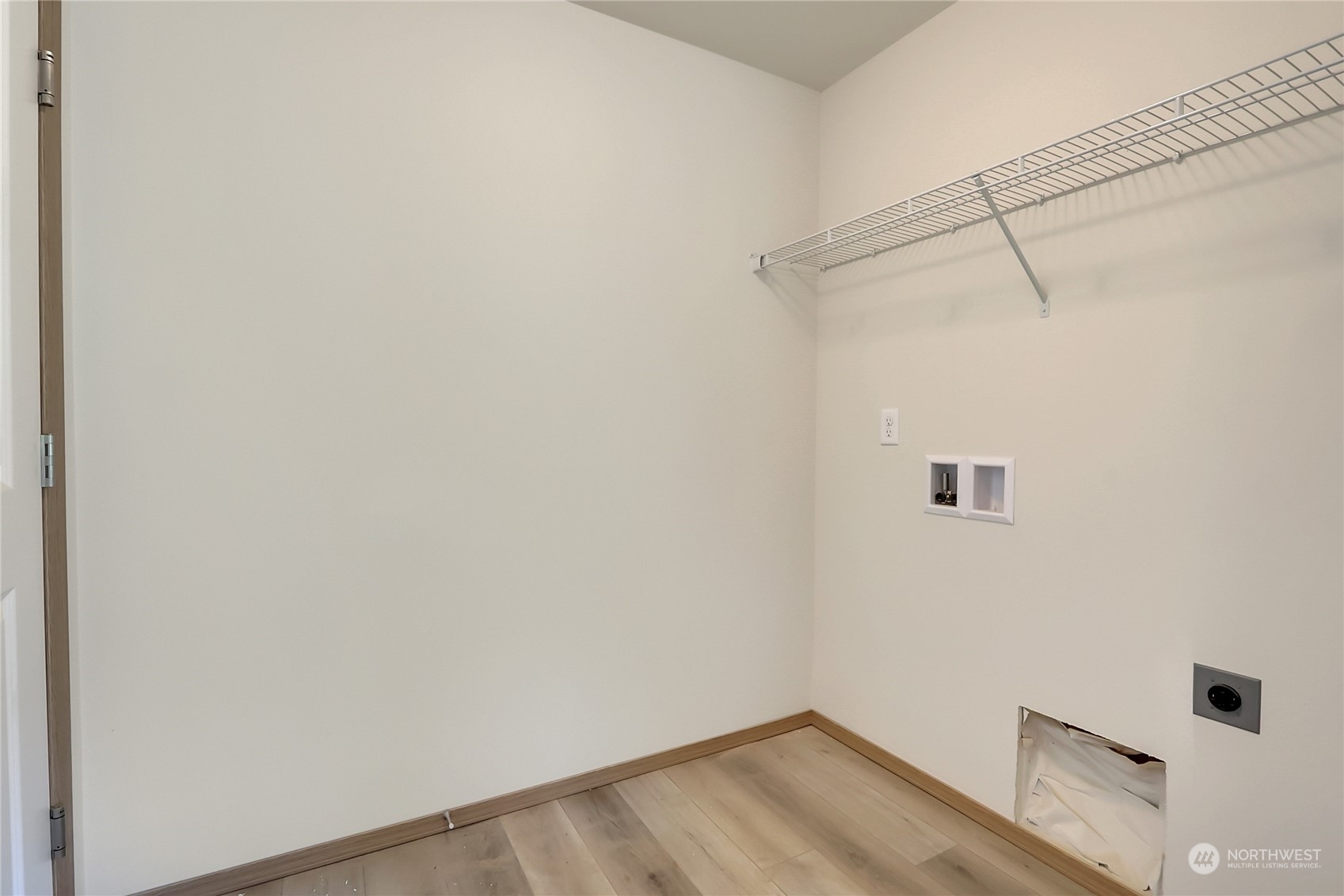 114 Gunnell Road Winlock, WA 98596 - Photo 9 of 23 a view of a room with racks on the wall