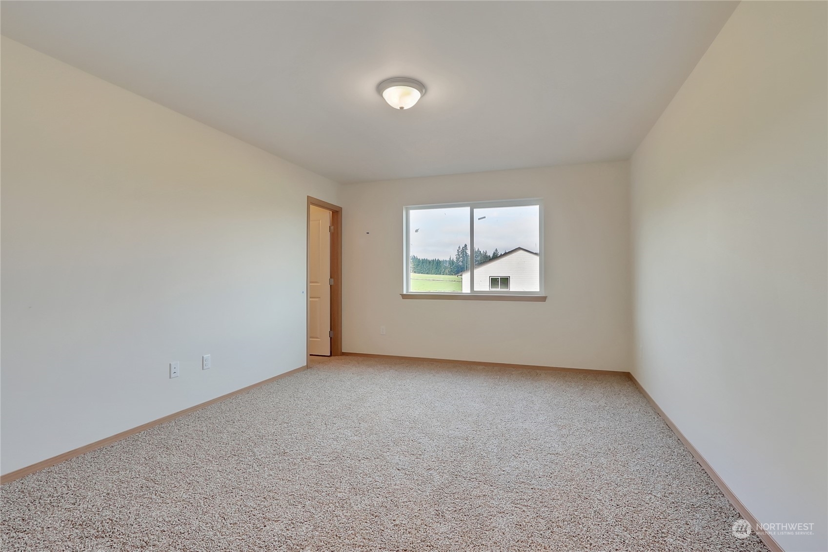 114 Gunnell Road Winlock, WA 98596 - Photo 10 of 23 an empty room with windows and closet
