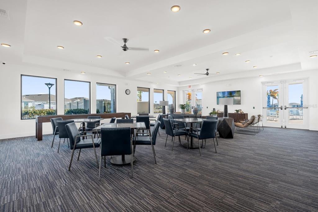 1911 Spring Shower Circle Kissimmee, FL 34744 - Photo 32 of 52 a view of a dining room with furniture window and wooden floor