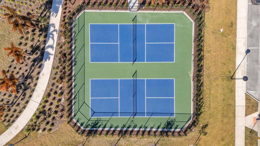 1911 Spring Shower Circle Kissimmee, FL 34744 - Photo 43 of 52 a view of a house with a small yard