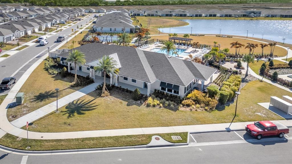 1911 Spring Shower Circle Kissimmee, FL 34744 - Photo 52 of 52 an aerial view of a house with a yard and lake view