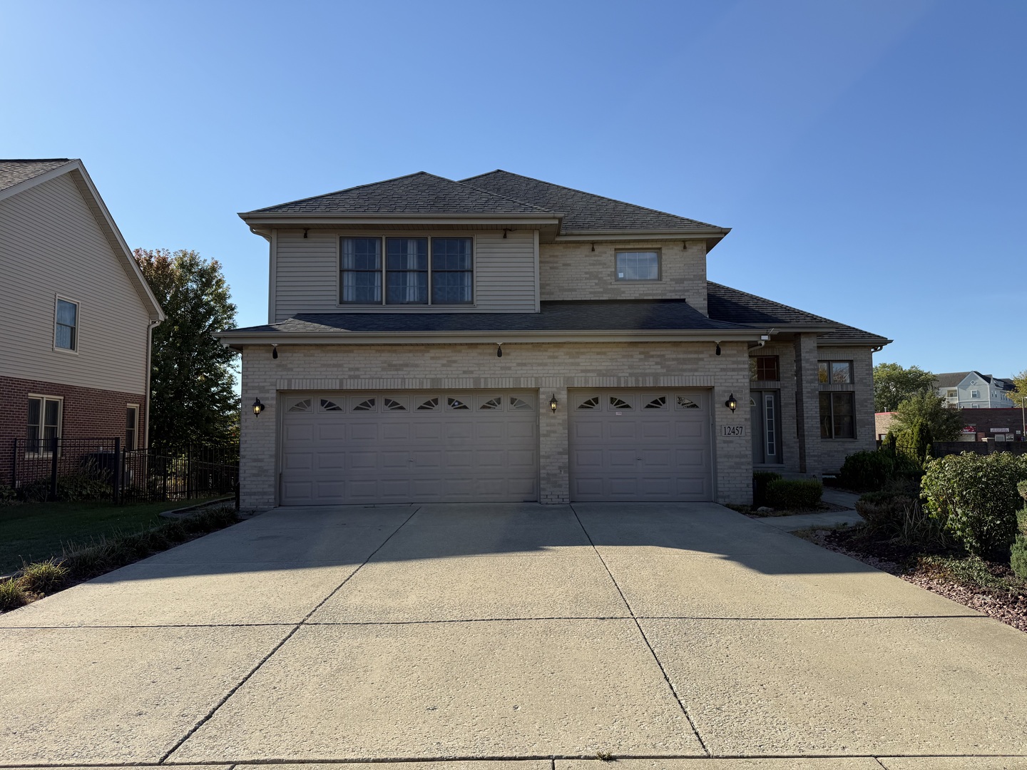 a front view of a house with yard