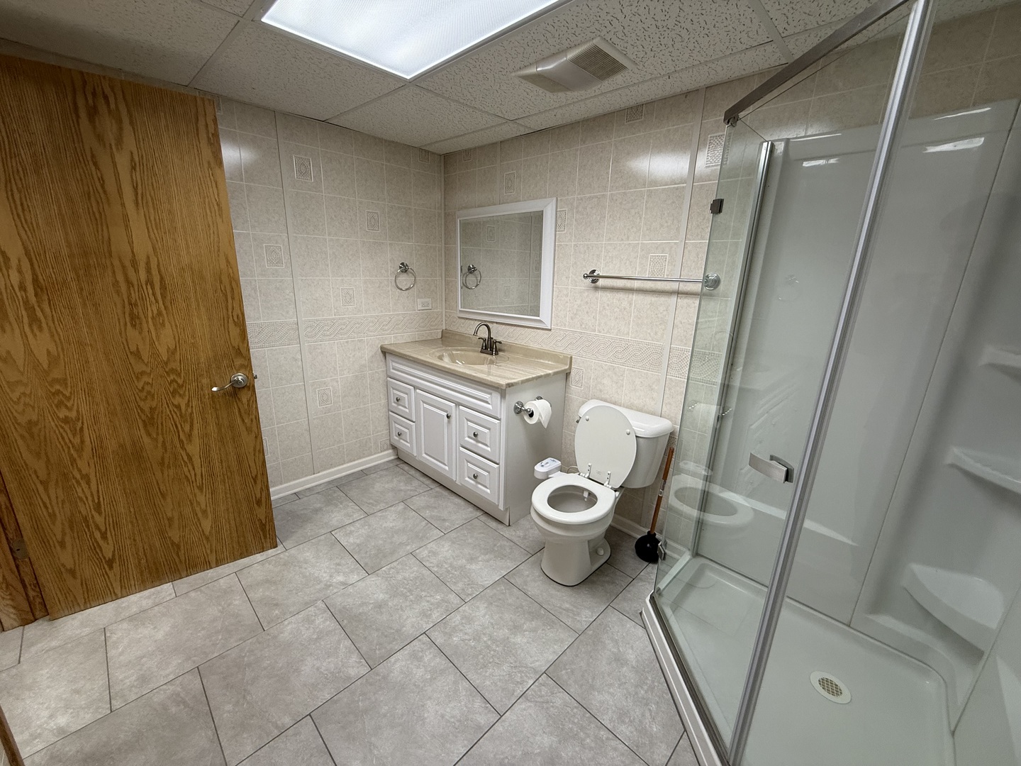 12457 Walden Road Homer Glen, IL 60491 - Photo 19 of 20 a bathroom with a granite countertop sink toilet and shower