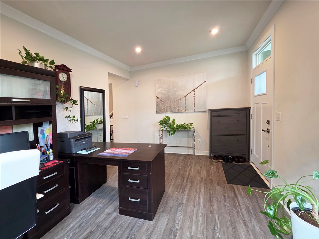 224 Bronson Ridge Anderson, SC 29621 - Photo 3 of 42 A versatile space offering a home office setup and an inviting entry with durable flooring.