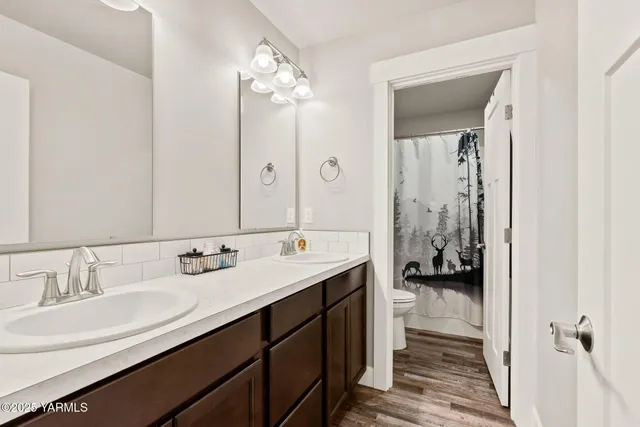 a view of a patio with couches chairs and potted plants