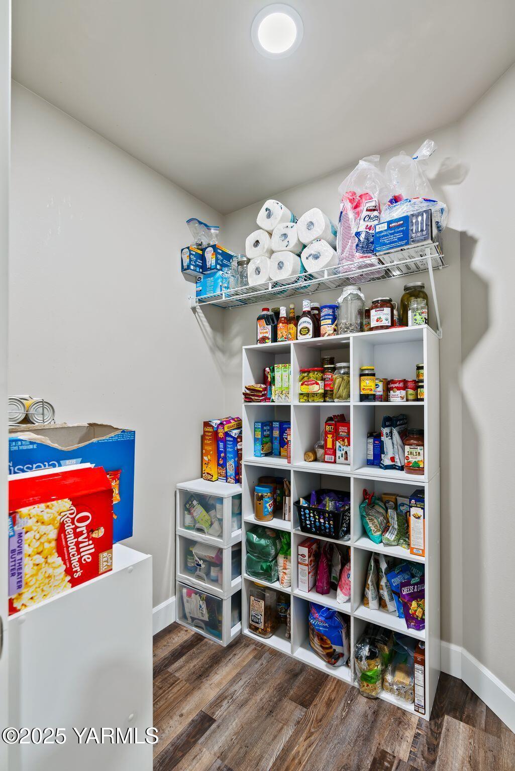192 Sage Cove Road Yakima, WA 98903 - Photo 19 of 33 a cabinet with a book shelf