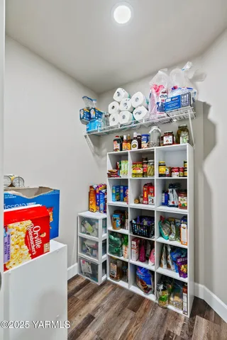 a front view of a house with table and chairs