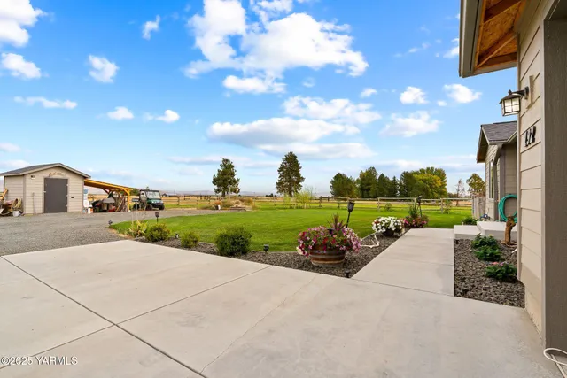 a view of car parked in front of house