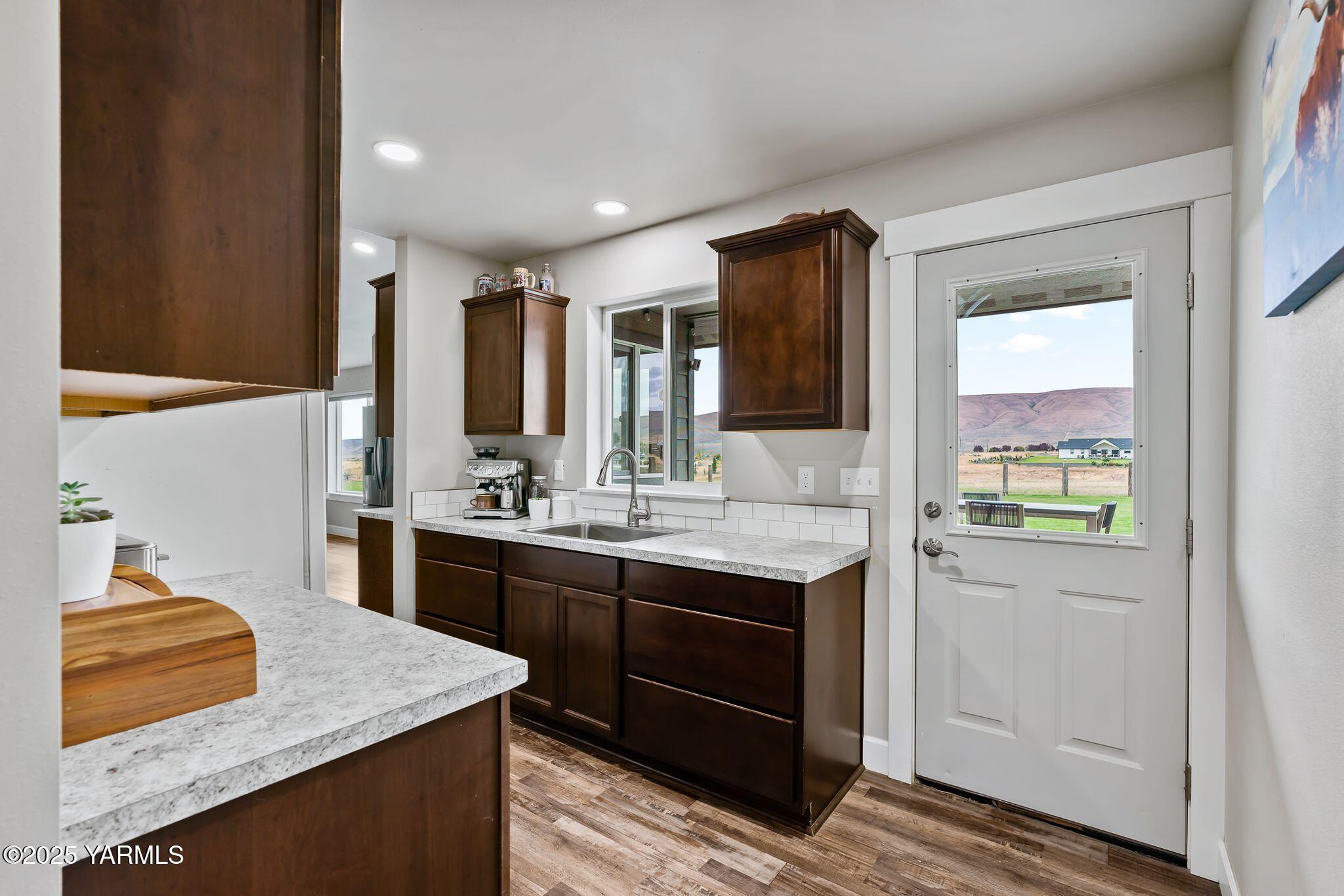 192 Sage Cove Road Yakima, WA 98903 - Photo 8 of 33 a bathroom with a sink double vanity granite and a mirror