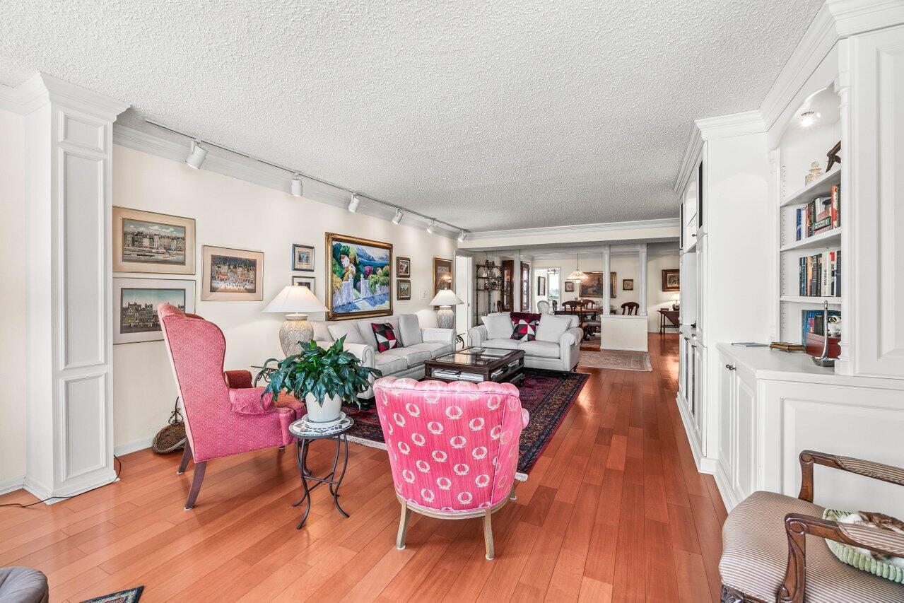 2000 South Ocean Boulevard, Unit 306 Delray Beach, FL 33483 - Photo 6 of 42 a living room with furniture and wooden floor